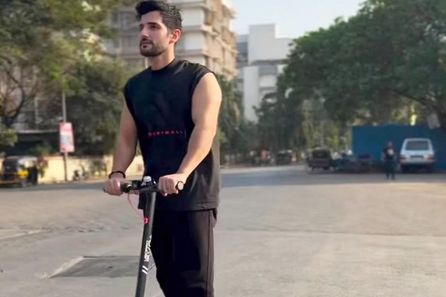 Aditya Seal takes e-scooter to work to reduce carbon footprint