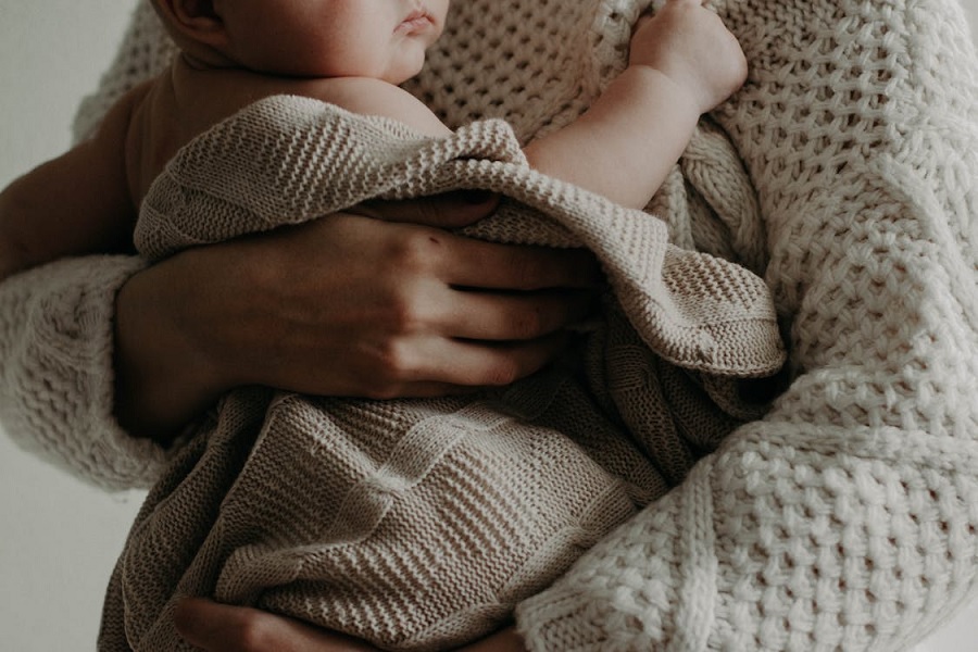 Wrapped in Warmth: The Heart of Motherhood and Parenting