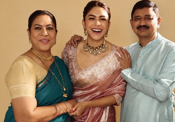 Mrunal Thakur shares family pic with parents, calls herself their ‘beloved daughter