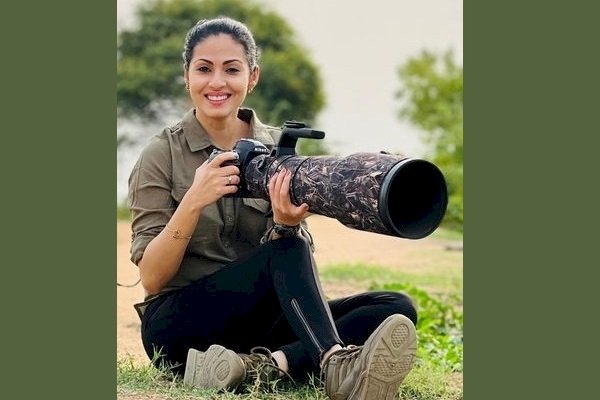 Actress-wildlife photographer Sadaa poses with panther named Shyama