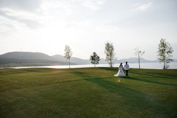 Capturing Love in Nature: A Dreamy Lawn Photoshoot in a White Gown