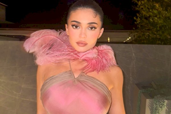 Kylie Jenner sets mercury soaring as she sizzles in gold metallic bikini