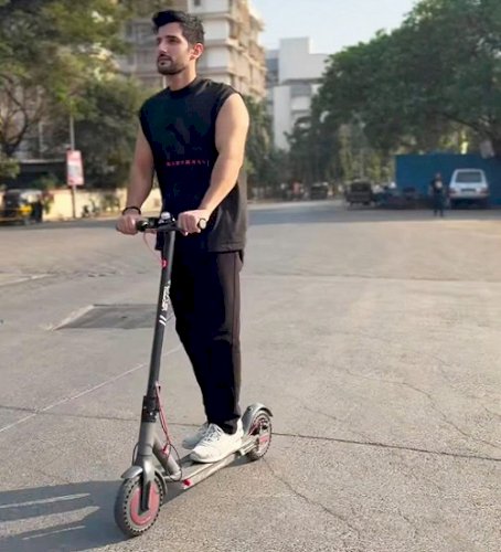 Aditya Seal takes e-scooter to work to reduce carbon footprint