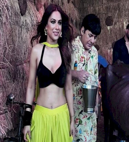 Nia Sharma embraces her desi side as she tries milking a buffalo for the first time