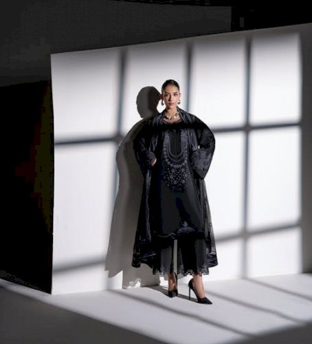 Elegance in Shadows: The Power of a Black Eastern Dress
