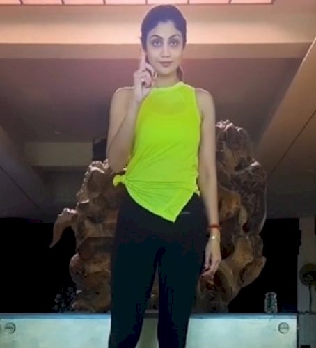 Shilpa Shetty demonstrates a yoga pose that helps improve balance and concentration