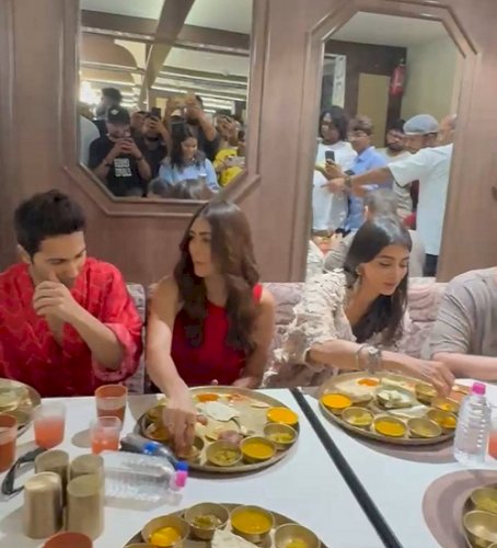 Varun Dhawan feeds Mrunal Thakur & Pooja Hegde as the three enjoy a delicious thali in Ahmedabad