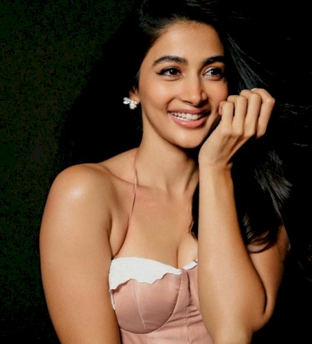 Pooja Hegde aces walking backwards on a treadmill in style